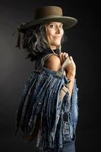 Load image into Gallery viewer, Upcycled from a whole lotta salvaged denim scraps, carefully sewn onto a salvaged denim bag with one interior pocket. This bag has both hand straps, as well as a shoulder strap for versatility! Not only are you choosing eco conscious with using textiles saved from the landfill, this bag is super unique and fly! DENIM DENIM DENIM!
Handcrafted with love and intention.
One-of-a-kind
Denim vibes
Handmade in Santa Cruz, CA