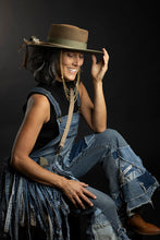 Load image into Gallery viewer, Upcycled from a whole lotta salvaged denim scraps, carefully sewn onto a salvaged denim bag with one interior pocket. This bag has both hand straps, as well as a shoulder strap for versatility! Not only are you choosing eco conscious with using textiles saved from the landfill, this bag is super unique and fly! DENIM DENIM DENIM!
Handcrafted with love and intention.
One-of-a-kind
Denim vibes
Handmade in Santa Cruz, CA