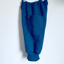 Load image into Gallery viewer, Upcycled from an adult cashmere sweater top. Super soft, cozy, with large pockets for all those magical finds! Elastic waistband and more of the cashmere sweater for the cuffs. Intentional revealed stitching and notions for extra whimsy. 
Handcrafted with love and intention.
One-of-a-kind
Cozy playground vibes
Size 4-5T
Handmade in Santa Cruz, CA