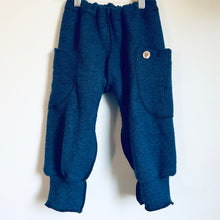 Load image into Gallery viewer, Upcycled from an adult cashmere sweater top. Super soft, cozy, with large pockets for all those magical finds! Elastic waistband and more of the cashmere sweater for the cuffs. Intentional revealed stitching and notions for extra whimsy. 
Handcrafted with love and intention.
One-of-a-kind
Cozy playground vibes
Size 4-5T
Handmade in Santa Cruz, CA