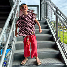 Load image into Gallery viewer, <p>Upcycled from salvaged vintage linen cotton curtain panels, dyed, and upcycled into these loose and flowy, wide leg pants/capri pants. We are all about comfort and versatility! Cord waist string, revealed stitching for color and whimsy. Cotton graphic tee with buck horn vibes.   </p> <p>Handcrafted with love and intention. </p> <ul> <li>Handmade in Santa Cruz, CA</li> <li>One-of-a-kind</li> <li>Size 7-9 youth (wide fit, can also work for bigger sizes as capri pants!</li> </ul>