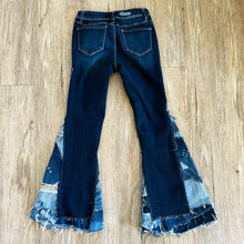 Load image into Gallery viewer, Upcycled from salvaged denim. Base jeans are from YMIGirl Kids size 7, in great condition! Stretch denim with some intentional distress. Added denim bits and pieces, sashiko stitching for detail and embellishment, medium-flared bottoms. 
Handcrafted with love and intention.
One-of-a-kind
Fresh vibes
Size 7
Cold wash, like you would any pair of jeans, for longevity
Handmade in Santa Cruz, CA