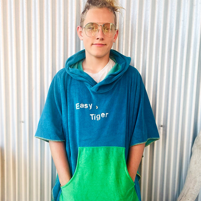 <p>Upcycled from remnant french terry scraps, with a hand fabric painted whimsical stencil print. Lightweight, super flowy, with oversized front pocket and hoodie. It's a perfect layer of cozy and playful: EASY, TIGER.</p> <p>Handcrafted with love and intention.</p>