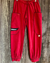 Load image into Gallery viewer, Upcycled from salvaged Juicy Couture french terry remnants and a cut from an organic cotton graphic tee. Super soft and cozy, and embellished with detail and revealed stitching! Elastic waistband with oversized pockets, for all those magical finds. 
Handcrafted with love and intention.
One-of-a-kind
Fly like an eagle vibes
Size 8T
Cold wash
Handmade in Santa Cruz, CA