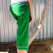 Load image into Gallery viewer, Upcycled from salvaged cotton blend dress, and an IRIECYCLE linocut block print patch on cotton tee for pocket. This fabric has a bit of stretch to it, so its perfect for play and movement! Cord waist string, revealed stitching for color and whimsy. Capris length vibes.   