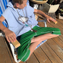 Load image into Gallery viewer, Upcycled from salvaged cotton blend dress, and an IRIECYCLE linocut block print patch on cotton tee for pocket. This fabric has a bit of stretch to it, so its perfect for play and movement! Cord waist string, revealed stitching for color and whimsy. Capris length vibes.   