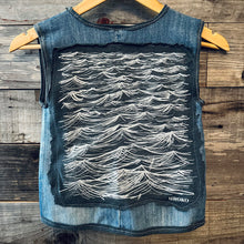 Load image into Gallery viewer, Upcycled from several denim jeans, salvaged Uroko t-shirt (local Santa Cruz clothing brand loving sea and scales), and love. A pocket for special little finds, and salvaged cord tie with detail.
Handcrafted with love and intention. 
Upcycled spirit vest
One-of-a-kind
Size 8-9 youth
Cold wash
Handmade in Santa Cruz, CA