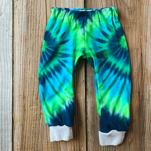 <p>Upcycled from a tie dyed cotton tee and hoodie! Cuffed bottoms, super cool vibes. Ready to FLOW! </p> <p>Handcrafted with love and intention.</p>