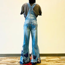 Load image into Gallery viewer, Upcycled from salvaged denim overalls, super colorful denim pants, and a lot of hand stitching and other denim scraps for embellishments and fun and unique detail. Base jeans are from American Rag Cie adult size 1 (XS/S adult), and in excellent condition! All intentional distress/rips that are significant have been also lined with fun fabric, so this piece is durable! Added amazing denim bits and pieces to create medium-flared bottoms. 