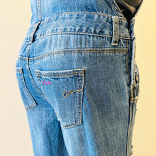 Load image into Gallery viewer, Upcycled from salvaged denim overalls, super colorful denim pants, and a lot of hand stitching and other denim scraps for embellishments and fun and unique detail. Base jeans are from American Rag Cie adult size 1 (XS/S adult), and in excellent condition! All intentional distress/rips that are significant have been also lined with fun fabric, so this piece is durable! Added amazing denim bits and pieces to create medium-flared bottoms. 