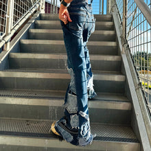 Load image into Gallery viewer, Upcycled from salvaged super stretch denim overalls, super colorful denim scraps, and hand stitching for added whimsy. More denim scraps as added embellishments and fun and unique detail. Base jeans are Cat & Jack, youth size 10/12, and in excellent condition! Intentional distress, fun denim bits and pieces fabric, this piece is super cute! Medium-flared bottoms. 