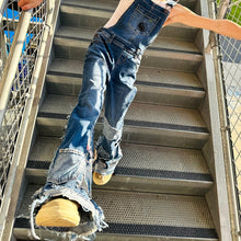 Load image into Gallery viewer, Upcycled from salvaged super stretch denim overalls, super colorful denim scraps, and hand stitching for added whimsy. More denim scraps as added embellishments and fun and unique detail. Base jeans are Cat & Jack, youth size 10/12, and in excellent condition! Intentional distress, fun denim bits and pieces fabric, this piece is super cute! Medium-flared bottoms. 