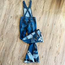 Load image into Gallery viewer, Upcycled from salvaged super stretch denim overalls, super colorful denim scraps, and hand stitching for added whimsy. More denim scraps as added embellishments and fun and unique detail. Base jeans are Cat & Jack, youth size 10/12, and in excellent condition! Intentional distress, fun denim bits and pieces fabric, this piece is super cute! Medium-flared bottoms. 
