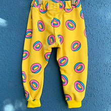 Load image into Gallery viewer, Upcycled from a retro graphic cotton hoodie! Cuffed bottoms, super yummy, and textile is durable and ready for the playground! All the kids will be lining up for some DONUTS!   Handcrafted with love and intention.  Handmade in Santa Cruz, CA One-of-a-kind Retro vibes Size 18-24 mo Cuff bottoms
