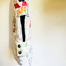 Load image into Gallery viewer, Upcycled from a cotton linen curtain, and adult cotton pants. Lined, with little details, pockets and a zipper. Whimsical, durable, a perfect layer of cozy and fun. 
Handcrafted with love and intention. 
Upcycled jacket vest
One-of-a-kind
Size 10-12 youth/ M
Cold wash
Handmade in Santa Cruz, CA