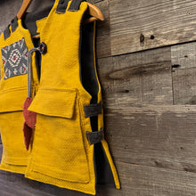 Load image into Gallery viewer, Upcycled from a cotton blend ladies skirt, cotton dress top and salvaged piece of vintage tapestry. Details, smock vibes, and revealed stitching for added whimsey and uniqueness. Two heavy duty pockets for all the magical finds, lined and a perfect layer of cozy and fresh. 
Handcrafted with love and intention. 
Upcycled spirit vest
One-of-a-kind
Size 8-10 youth
Cold wash, hang dry
Handmade in Santa Cruz, CA