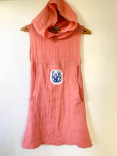 Load image into Gallery viewer, Upcycled from remnant gauze cotton fabric and hand printed mushroom patch. Oversized "kanga" pocket goes all the way down to the bottom of dress for maximum magical storage of love and treasures! Super comfortable, extremely soft and flowy, with a hood for that extra layer of cozy.   Handcrafted with love and intention.   Upcycled sleeveless dress One-of-a-kind Oversized front "kanga" pouch pocket Growing/mushroom vibes Handmade in Santa Cruz, CA