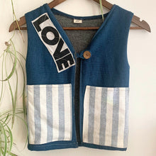 Load image into Gallery viewer, Upcycled from linen/cotton pillowcases, salvaged &quot;LOVE&quot; graphics from cotton tee, lined with french terry for warmth and comfort.    Handcrafted with love and intention.   Button clasp Backpack pocket* Large pockets for treasures Handmade in Santa Cruz, CA Size 5/6T Cold wash, hang dry * Monkey not included. xo
