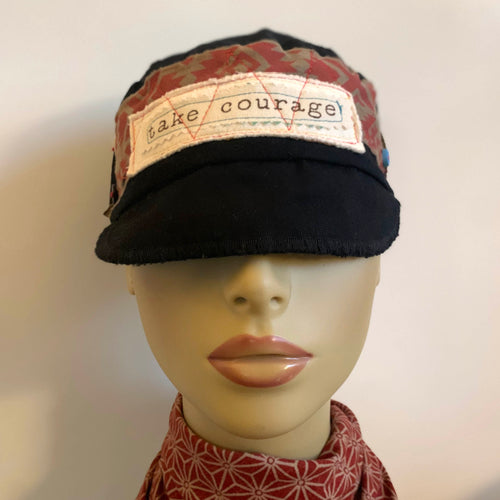 One of a kind design elements and embellishments upcycled from salvaged remnant fabric scraps, and hand sewn in Santa Cruz, CA. 100% cotton cap, handmade in Bali.   Conscious message: Take courage  Native print graphic Black colored cap Button embellishments 100% cotton US size 7 1/8