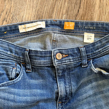 Load image into Gallery viewer, Upcycled from salvaged denim threads, and my own hand screen printed patch &quot;BEcause the eARTh&quot;. Base jeans are from Pilcro and the Letterpress&nbsp;Womens size 27, and in great condition! Some give/stretch denim with some intentional distress. Added denim bits and pieces to create flared bottoms.
