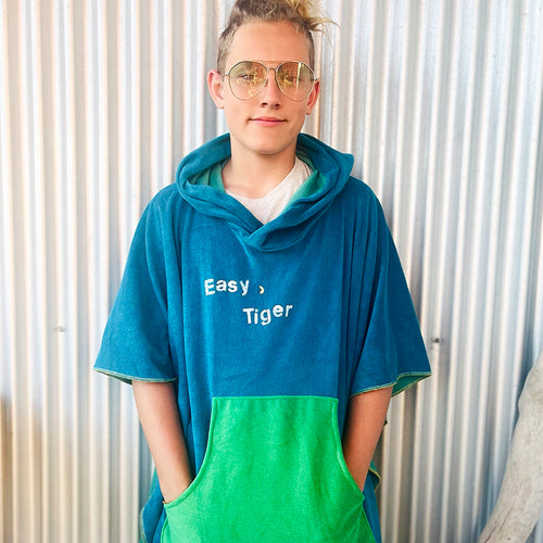 <p>Upcycled from remnant french terry scraps, with a hand fabric painted whimsical stencil print. Lightweight, super flowy, with oversized front pocket and hoodie. It's a perfect layer of cozy and playful: EASY, TIGER.</p> <p>Handcrafted with love and intention.</p>