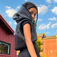 Load image into Gallery viewer, Upcycled from fleece remnant fabric. Oversized hoodie and sunrise vibes.&nbsp;

Handcrafted with love and intention.&nbsp;

Upcycled&nbsp;spirit vest
One-of-a-kind
Size 8-10 youth

Cold wash
Handmade in Santa Cruz, CA
