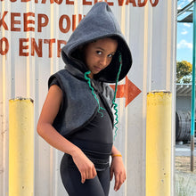 Load image into Gallery viewer, Upcycled from fleece remnant fabric. Oversized hoodie and sunrise vibes.&nbsp;

Handcrafted with love and intention.&nbsp;

Upcycled&nbsp;spirit vest
One-of-a-kind
Size 8-10 youth

Cold wash
Handmade in Santa Cruz, CA
