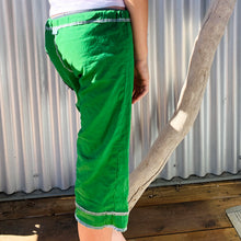 Load image into Gallery viewer, Upcycled from salvaged cotton blend dress, and an IRIECYCLE linocut block print patch on cotton tee for pocket. This fabric has a bit of stretch to it, so its perfect for play and movement! Cord waist string, revealed stitching for color and whimsy. Capris length vibes.&nbsp; &nbsp;

