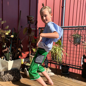 Upcycled from salvaged cotton blend dress, and an IRIECYCLE linocut block print patch on cotton tee for pocket. This fabric has a bit of stretch to it, so its perfect for play and movement! Cord waist string, revealed stitching for color and whimsy. Capris length vibes.&nbsp; &nbsp;