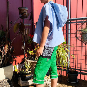 Upcycled from salvaged cotton blend dress, and an IRIECYCLE linocut block print patch on cotton tee for pocket. This fabric has a bit of stretch to it, so its perfect for play and movement! Cord waist string, revealed stitching for color and whimsy. Capris length vibes.&nbsp; &nbsp;