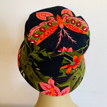 Load image into Gallery viewer, Indian dress upcycled into this reversible bucket hat. Each side uses different parts of the garmet, so that each has its own vibe - one with butterfly and flowers, the other tiger and tiger abstract spots. Midweight interfacing so the brim is a bit stiffer on this one.
