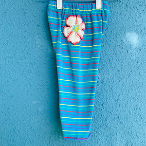 Upcycled from stretch cotton knit remnant fabric and embroidered flowers on cotton tee! Flare bottoms, and color vibrant - just like your little!    Handcrafted with love and intention.  Handmade in Santa Cruz, CA One-of-a-kind Hippy vibes Size 6-9 mo Flare bottoms