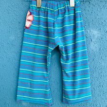 Load image into Gallery viewer, Upcycled from stretch cotton knit remnant fabric and embroidered flowers on cotton tee! Flare bottoms, and color vibrant - just like your little!    Handcrafted with love and intention.  Handmade in Santa Cruz, CA One-of-a-kind Hippy vibes Size 6-9 mo Flare bottoms
