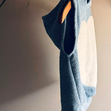 Load image into Gallery viewer, Upcycled from vintage remnant terry and fleece scrap. Cozy little layer of warmth and comfort, with a hoodie and LOVE vibes.&nbsp;

Handcrafted with love and intention.&nbsp;

Upcycled&nbsp;spirit vest
One-of-a-kind
Size 6-8 youth

Cold wash
Handmade in Santa Cruz, CA
