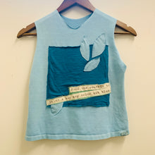 Load image into Gallery viewer, Upcycled from adult cotton tee, conscious message fabric remnant, and love and intention. A colorful and vibrant summer top.    Handcrafted with love and intention.   Upcycled sleeveless top One-of-a-kind Courageous and colorful vibes Handmade in Santa Cruz, CA
