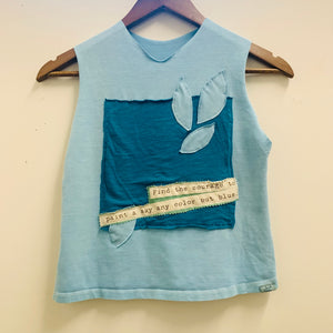 Upcycled from adult cotton tee, conscious message fabric remnant, and love and intention. A colorful and vibrant summer top.    Handcrafted with love and intention.   Upcycled sleeveless top One-of-a-kind Courageous and colorful vibes Handmade in Santa Cruz, CA
