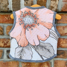 Load image into Gallery viewer, Upcycled from a vintage quilt and cotton ribbed top. Super amazing fabric and salvaged large button. This spirit vest is lightweight and a sweet layer of love!   Handcrafted with love and intention.   Upcycled and one-of-a-kind Button and fabric clasp A little pocket for treasures Lightweight Handmade in Santa Cruz, CA Cold wash, hang dry
