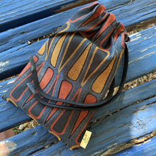 Load image into Gallery viewer, Upcycled from salvaged upholstery sample fabrics. Perfect to carry your favorite tarot/ special card deck with you, or store in. Color combo: orange/yellow/blue.  Handcrafted with love and intention.   Handmade in Santa Cruz, CA One-of-a-kind High quality Peruvian woven fabric Fits larger size cards, 6&quot; x 8&quot; Adjustable tie strap Cold wash, hang dry
