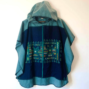 Upcycled from salvaged washed green remnant jean fabric and vintage Guatemalan tapestry.   Handcrafted with love and intention.  Upcycled poncho One-of-a-kind Oversized hooded poncho All size Handmade in Santa Cruz, CA