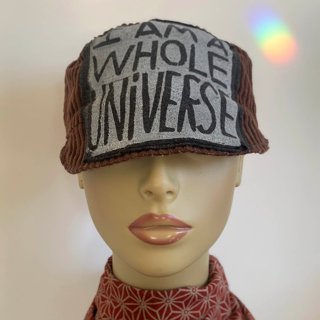 One of a kind design elements and embellishments upcycled from salvaged remnant fabric scraps, and hand sewn in Santa Cruz, CA. 100% cotton cap, handmade in Bali.   High vibration elements  Brown corduroy cap Block print patch by Iriecyclearts 100% cotton US size 7 1/2
