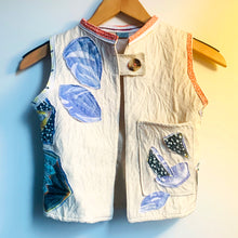 Load image into Gallery viewer, Upcycled from a cotton blend blazer jacket and Lulie Wallace pillowcase, now this delicious and whimsical vest for that perfect extra layer of warmth.   Handcrafted with love and intention.   Upcycled and one-of-a-kind Button clasp Light and whimsical layer of love Handmade in Santa Cruz, CA Size 3-4T Butterfly vibes Cold wash, hang dry
