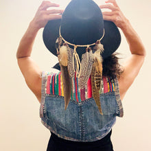 Load image into Gallery viewer, Upcycled a well loved and ripped jean jacket, and vintage Guatemalan remnant into this bolero style, eclectic denim vest. Buttons and pockets still intact. Wear your light layer of fly! Handcrafted with love and intention.   Handmade in Santa Cruz, CA One-of-a-kind Bolero vest Guatemalan vibes Cold wash
