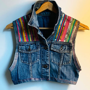 Upcycled a well loved and ripped jean jacket, and vintage Guatemalan remnant into this bolero style, eclectic denim vest. Buttons and pockets still intact. Wear your light layer of fly! Handcrafted with love and intention.   Handmade in Santa Cruz, CA One-of-a-kind Bolero vest Guatemalan vibes Cold wash