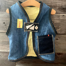 Load image into Gallery viewer, Upcycled from jeans, graphic tee, and salvaged embellishments. Lined with cotton tee. This cute vest is the perfect layer of warmth and love.   Handcrafted with love and intention.   Upcycled and one-of-a-kind Handmade in Santa Cruz, CA Size 2-3T I AM HAPPY 
