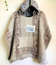 Load image into Gallery viewer, Upcycled from a vintage Indonesian woven Ikat blanket (from the 60s!!), and salvaged graphic message off a cotton Shari Elf hoody. Natural discoloration from aged fabric, with lots of character and good vibes. What stands in the way IS the way. 100%  Handcrafted with love and intention.  Upcycled poncho Oversized pocket Vintage Indonesian woven Ikat blanket  One-of-a-kind Free size, adult Conscious and eco-conscious vibes Handmade in Santa Cruz, CA Cold wash, hang dry
